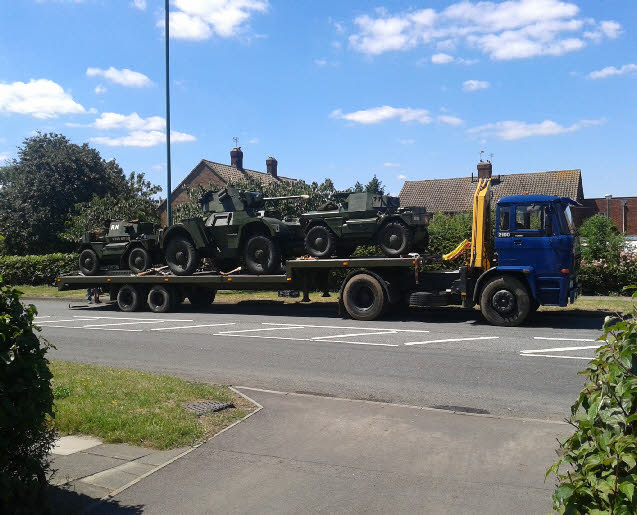 he authors three vehicles loaded up and ready to be taken to a show 2015.